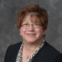 Kim B Clarke