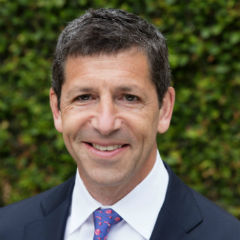 Adam M Kriger