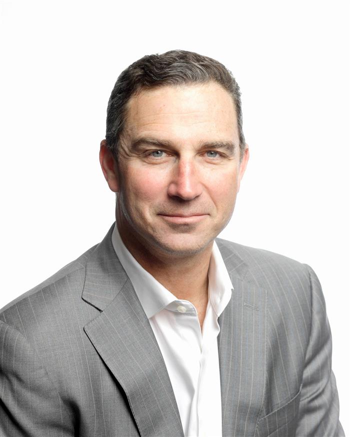Mark L. Baum