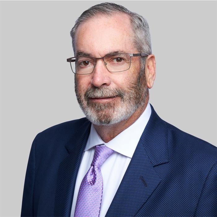 Dennis J Langwell