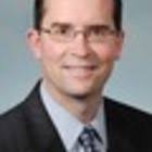 Mark E Tryniski