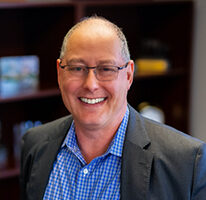 Mr. Mark T. Behrman