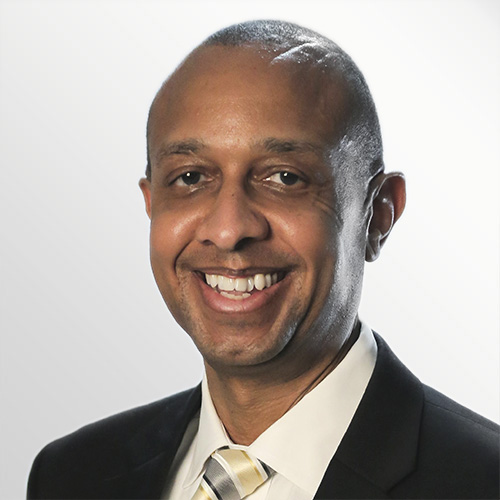Desmond J Mills